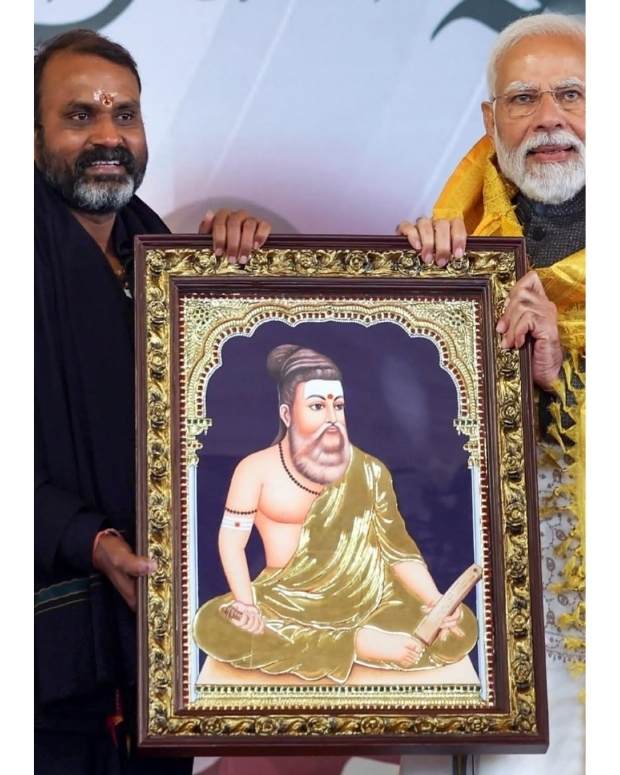dr Lmurugan bjp with modi with tanjore art